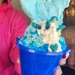 Sugar Boogar AZ - Shark Shart: Blueberry Razz, Boogar cream, whipped cream, gummy sharks, and cotton candy wave.