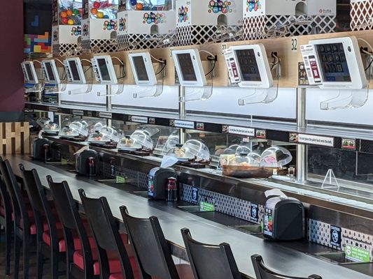 Kura Revolving Sushi Bar by null