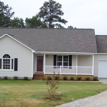 Dacota Group Builders - a house with a driveway - General Contractors Near Me Dacota Group Builders - a house with a driveway - General Contractors Near Me