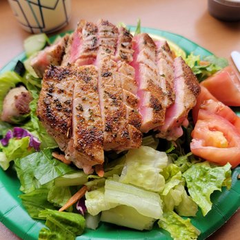 Tiki Grill - Yellow fin tuna medium rare on salad (also comes as a sandwich) - Comfort Food Near Me - Flagstaff, Arizona Tiki Grill - Yellow fin tuna medium rare on salad (also comes as a sandwich) - Comfort Food Near Me - Flagstaff, Arizona