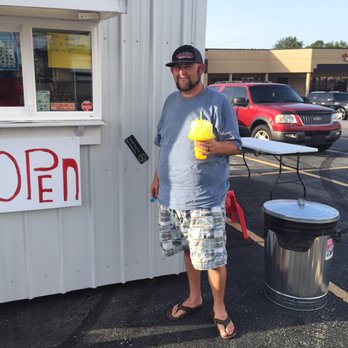 Tropical Sno Desserts - a man standing in front of an open sign - Shaved Ice Near Me - Piedmont, South Carolina Tropical Sno Desserts - a man standing in front of an open sign - Shaved Ice Near Me - Piedmont, South Carolina