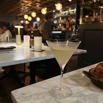 The Lick - Gin Gimlet and interior of the restaurant - American Near Me - Charleston, South Carolina
