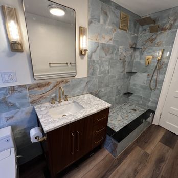 EUTS Construction - High-end bathroom remodel in early 1900s Buffalo home Delaware Park paneling installed as well. Complete gut renovation and update. - Tiling Near Me - Williamsville , New York