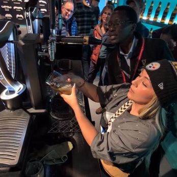 Guinness Storehouse - Emmanuel helping me while I pour my Guinness - Breweries Near Me - Dublin, D