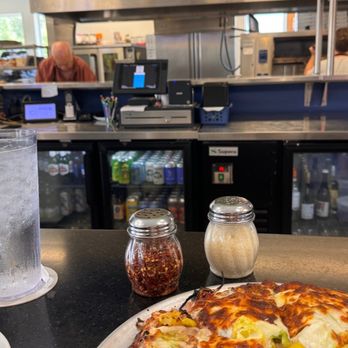Myles Pizza Pub - The guy in the picture is the owner and he's like a tank. - Pizza Near Me - Greenville, South Carolina Myles Pizza Pub - The guy in the picture is the owner and he's like a tank. - Pizza Near Me - Greenville, South Carolina