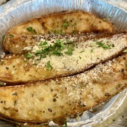 Della Cucina Italian Market & Catering - Parmesan potato wedge