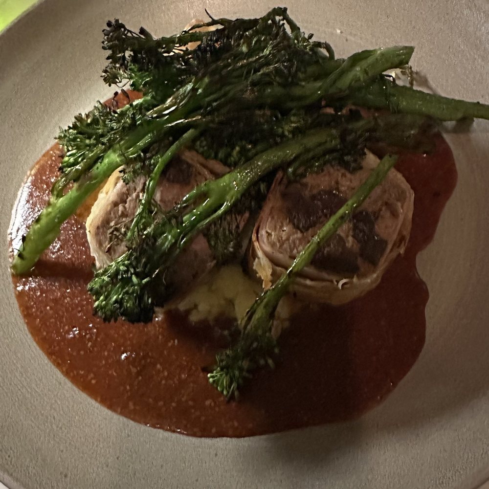 DSRT CLUB - Mr. Robinson's Meatloaf * wrapped in prosciutto | crispy phyllo| evoa mashed | grilled broccolini | Pilsner molasses glaze. - Supper Clubs Near Me - La Quinta, California DSRT CLUB - Mr. Robinson's Meatloaf * wrapped in prosciutto | crispy phyllo| evoa mashed | grilled broccolini | Pilsner molasses glaze. - Supper Clubs Near Me - La Quinta, California