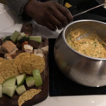 The Melting Pot - Tiny bit of cheese that's barely covering the bottom of the pot...smh! Don't waste your money people! - Fondue Near Me - Pittsburgh, Pennsylvania