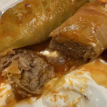 Piroshky Bakery - The meaty cabbage rolls are full of tender beef. How it looks sliced. - Russian Near Me - Bellevue, Washington Piroshky Bakery - The meaty cabbage rolls are full of tender beef. How it looks sliced. - Russian Near Me - Bellevue, Washington