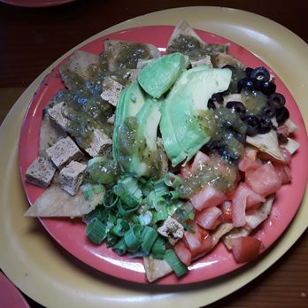 Squeeze In - Vegan chilaquiles with fried tofu- added the salsa because the order was super dry - American Near Me - Las Vegas, Nevada Squeeze In - Vegan chilaquiles with fried tofu- added the salsa because the order was super dry - American Near Me - Las Vegas, Nevada