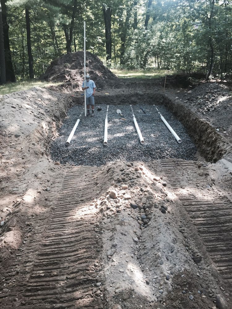 Slide of EmRay Excavating