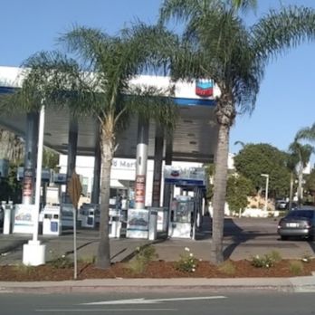 Chevron - a gas station with palm trees in the foreground - Gas Stations Near Me - San Diego, California Chevron - a gas station with palm trees in the foreground - Gas Stations Near Me - San Diego, California