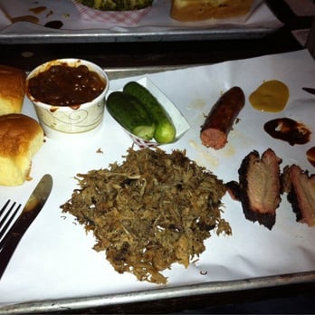 Fette Sau - Our spread. Pulled pork, spicy pork sausage, burnt end baked beans, house pickles, and rolls. - Barbeque Near Me - Brooklyn, New York Fette Sau - Our spread. Pulled pork, spicy pork sausage, burnt end baked beans, house pickles, and rolls. - Barbeque Near Me - Brooklyn, New York