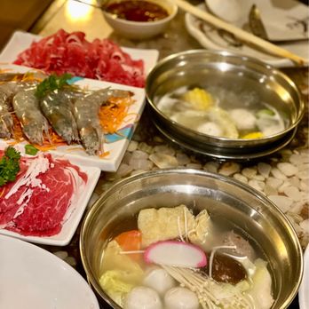 J's Mini Hot Pot - Different view of the mini hotpot in use. - Chinese Near Me - Duluth, Georgia