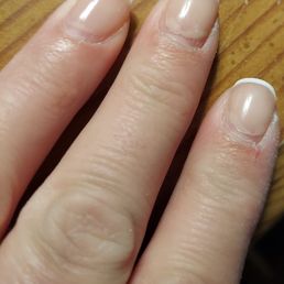 Peeling from the cuticle area. Can see the French design was nicely done but didn't last Peeling from the cuticle area. Can see the French design was nicely done but didn't last