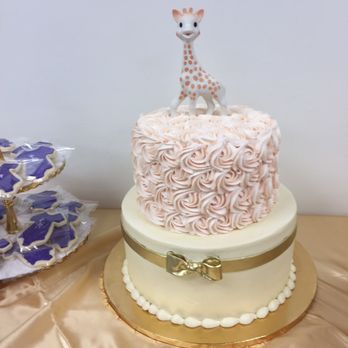 Amy's Pastry - Cake for baby shower. Buttercream frosting and the ribbon is fondant. Amazing! - Bakeries Near Me - Montebello, California Amy's Pastry - Cake for baby shower. Buttercream frosting and the ribbon is fondant. Amazing! - Bakeries Near Me - Montebello, California
