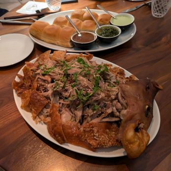 Serevene - @endoedibles on IG 10/26/24  #PORKISMYFAVORITEVEGETABLE - 1⁄2 suckling pig, sérêvène sauce tray, king's hawaiian soft rolls - French Near Me - Miami Beach, Florida