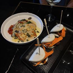 Chicken piccata on the left and pork belly bao buns on the right (yum). Chicken piccata on the left and pork belly bao buns on the right (yum).