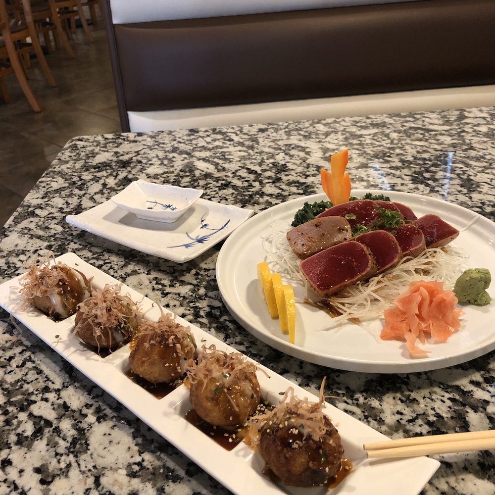Takoyaki and seared tuna. Takoyaki and seared tuna.