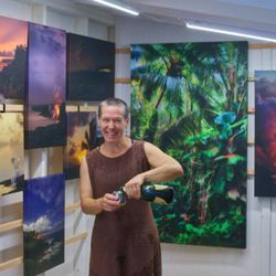 Island Photo - Mouse stretches and finishes all our prints right here. She's celebrating our opening day