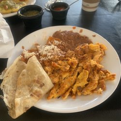 Café Olé - Huevos con chorizo fruit smoothly, and spinach omelette.