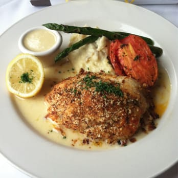 Chart House - Tilapia stuffed with crab meat. Also included mashed potatoes, grilled asparagus, and half of a tomato. - Seafood Near Me - Monterey, California