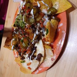 Lime - Queso nachos with fajitas, $20.95.