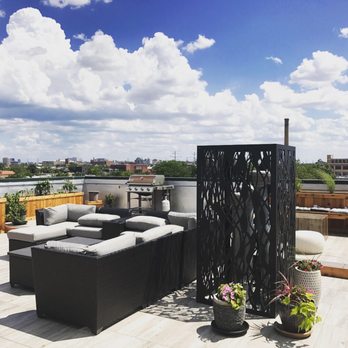 Busch Landscape inc - a patio with a couch and chairs - Landscaping Near Me - Evanston, Illinois