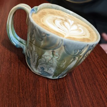 The Clay Cup - a latte art on a wooden table - Sandwiches Near Me - Neosho, Missouri The Clay Cup - a latte art on a wooden table - Sandwiches Near Me - Neosho, Missouri