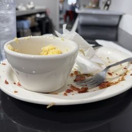 What's left of my chicken and waffles with cheesy grits... What's left of my chicken and waffles with cheesy grits...
