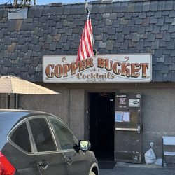 Copper Bucket - The entrance from the parking lot on the rear.