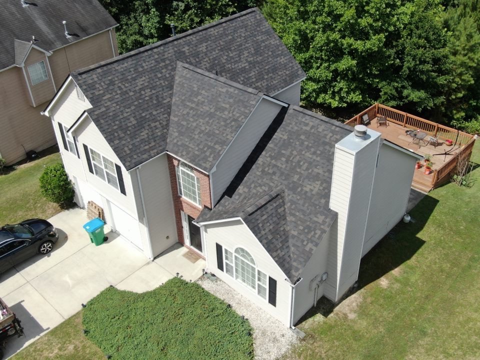 Slide of Whitaker Roofing Company