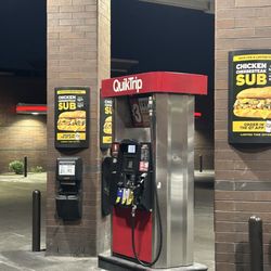 QuikTrip - Clean gas pumps with squeegee for washing windows