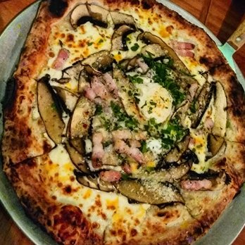 Rigo - Pizza Bismark with pancetta, portobello mushroom, truffle oil and egg - Spanish Near Me - Honolulu, Hawaii Rigo - Pizza Bismark with pancetta, portobello mushroom, truffle oil and egg - Spanish Near Me - Honolulu, Hawaii