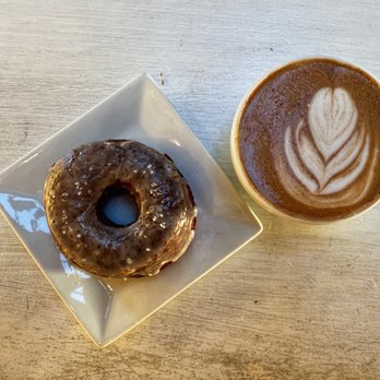 Zendo Coffee - Pretzel donut and a Zia latte - Coffee & Tea Near Me - Albuquerque, New Mexico Zendo Coffee - Pretzel donut and a Zia latte - Coffee & Tea Near Me - Albuquerque, New Mexico