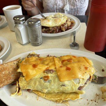 Southside Diner - Corn beef hash omelette and corn beef hash with three eggs over easy ! - Diners Near Me - Parma, Ohio Southside Diner - Corn beef hash omelette and corn beef hash with three eggs over easy ! - Diners Near Me - Parma, Ohio