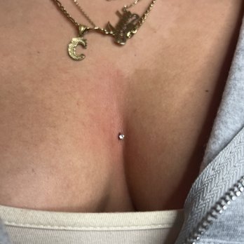 Gemmedbydaisy - Chest dermal piercing - Piercing Near Me
