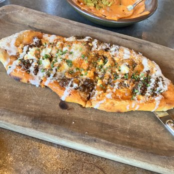 The Peacock - Khachapuri Turkish-Style Flatbread, Parmesan, Lamb Ragu, Farm Fresh Egg - Mediterranean Near Me - Austin, Texas The Peacock - Khachapuri Turkish-Style Flatbread, Parmesan, Lamb Ragu, Farm Fresh Egg - Mediterranean Near Me - Austin, Texas