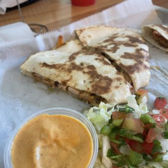 Tacos 4 Life - Chicken quesadilla and watermelon punch in the background - Tacos Near Me - Charlotte, North Carolina