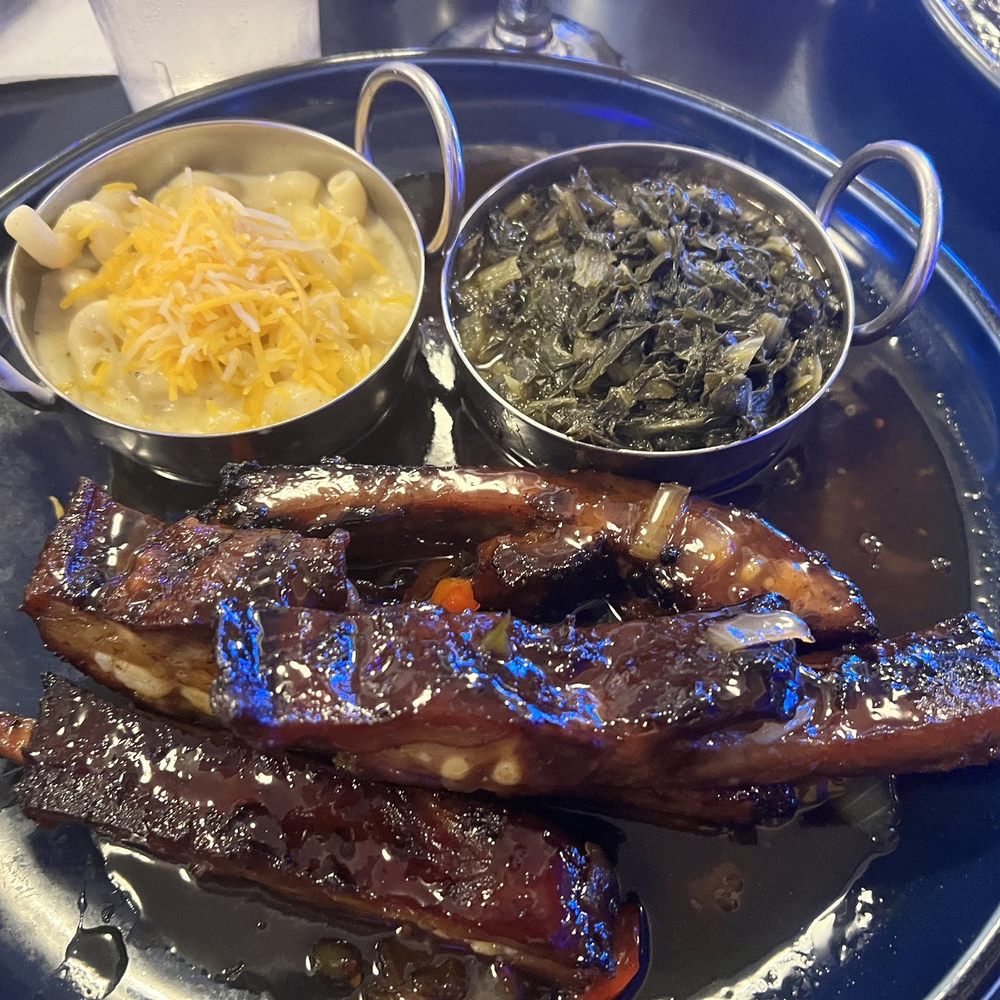 Godfreys - Sticky ribs with Mac n cheese and mixed greens - Caribbean Near Me - Flowood, Mississippi Godfreys - Sticky ribs with Mac n cheese and mixed greens - Caribbean Near Me - Flowood, Mississippi
