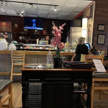 Satto Thai & Sushi Bar - a man standing at the counter - Sushi Bars Near Me - Atlanta, Georgia Satto Thai & Sushi Bar - a man standing at the counter - Sushi Bars Near Me - Atlanta, Georgia
