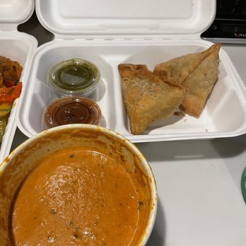 Turmeric Hut - Indian Restaurant - Chicken tikka masala and veggie samosas.  I forgot to take the picture so this pic is after I already ate some tikka masala oops - Indian Near Me - Oceanside, California