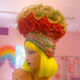 Lemon yellow hair with ruffled headdress.
