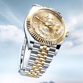 Morgan's Jewelers - The Rolex Sky-Dweller in Oystersteel and yellow gold with a champagne-colour dial and a bidirectional, rotatable fluted bezel. - Jewelry Near Me - Torrance, California Morgan's Jewelers - The Rolex Sky-Dweller in Oystersteel and yellow gold with a champagne-colour dial and a bidirectional, rotatable fluted bezel. - Jewelry Near Me - Torrance, California