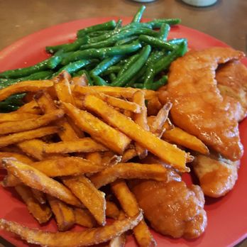 Crab Corner - Chicken fingers tossed in buffalo sauce with sweet potato fries and green beans. So yummy! - Seafood Near Me - Las Vegas, Nevada