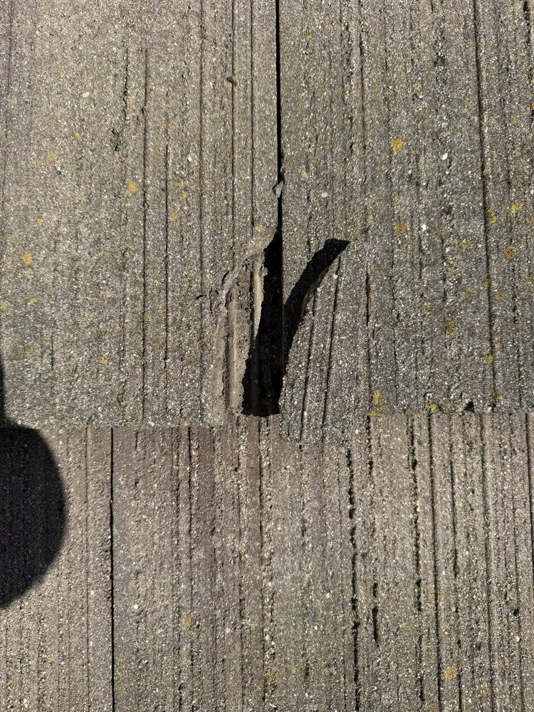 Slide of Nick’s Roofing