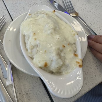 Crack'D Brunch - White cheddar grits - Breakfast & Brunch Near Me - New Orleans, Louisiana