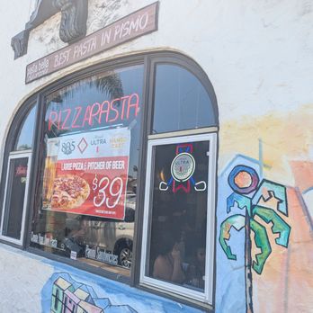 PizMo Cafe - Side with the pizza and beer deal posted - Pizza Near Me - Pismo Beach, California PizMo Cafe - Side with the pizza and beer deal posted - Pizza Near Me - Pismo Beach, California