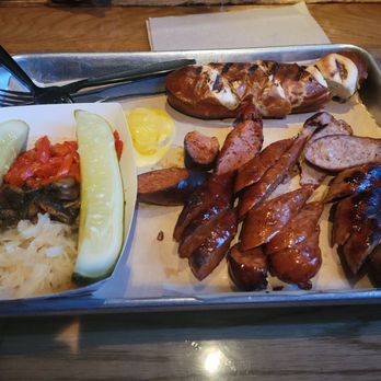 Wursthaus - Sausage Sampler--with topping and bread. - Pubs Near Me - Santa Ana, California Wursthaus - Sausage Sampler--with topping and bread. - Pubs Near Me - Santa Ana, California