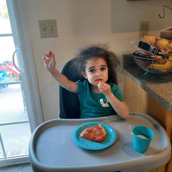 Hungry Hank's Pizzeria - youngest grandaughter enjoying her second pizza slice-#yummy! - Pizza Near Me - Jeannette, Pennsylvania Hungry Hank's Pizzeria - youngest grandaughter enjoying her second pizza slice-#yummy! - Pizza Near Me - Jeannette, Pennsylvania